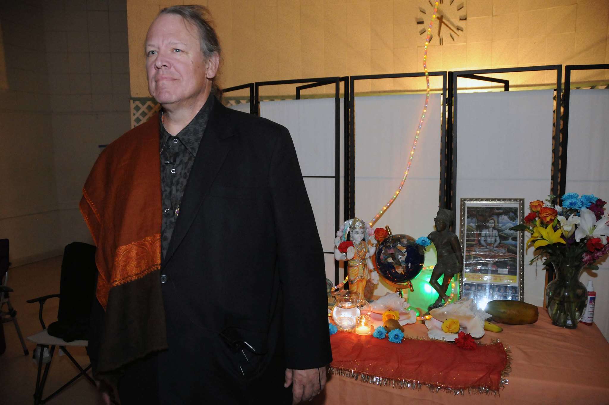 Mark Griffin in front of puja table