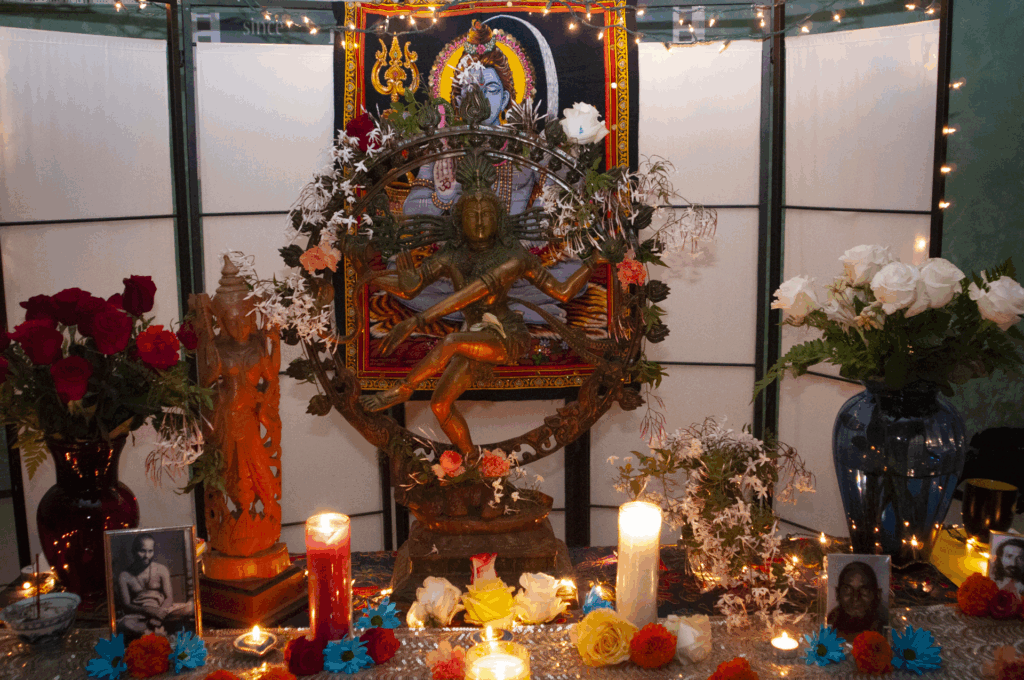 Puja table with statue of dancing Shiva